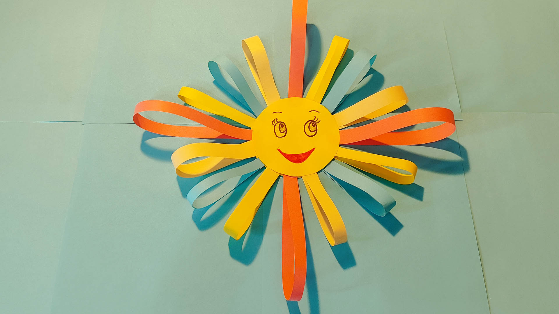 Поделка Весеннее солнце из полосок бумаги. Шаг 6